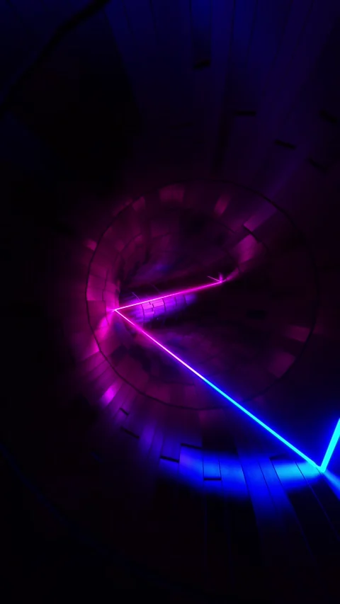 A laser moving in a circular tunnel. Vertical looped video Stock Footage 226372568