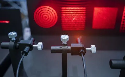 Laser on optical table in physics laboratory Stock Photos