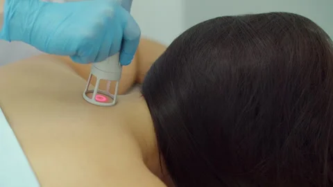 Laser physiotherapy applied to patient neck area Stock Footage 326061433
