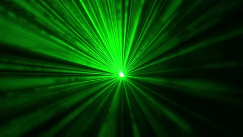The laser pointer shining in darkness with a green light. slow motion Stock Footage 163321784