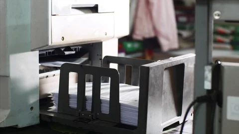 Laser print machine printing on big sheets of paper in typography office. Stock Footage 114738911