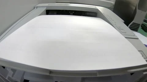 Laser printer printing paper documents in office Stock Footage 262087448