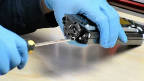 Laser Printer Toner Cartridge Disassembly with Screwdriver Stock Footage 320155642