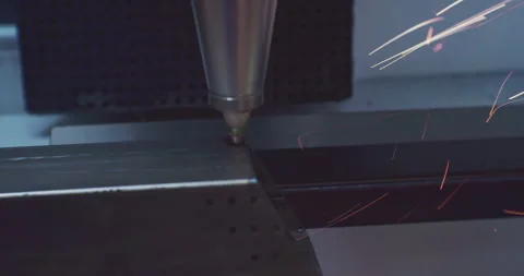 Laser processing of metal by a modern CNC machine tool.production of a part. Stock Footage 243854404