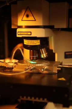 Laser processing of semiconductor nano components and movement of micro-parti Foto stock