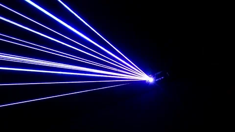 Laser projector emitting blue light beams. Stock Footage 341790209