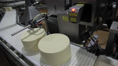 Laser puts the production date on the cheese Stock Footage 49071803