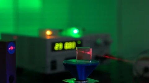 Laser in a quantum optics lab. Semiconductor laser on optical table in a quan Video stock 124996464
