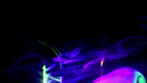 Laser rays lighting through the clouds of smoke. Smoke and laser rays. Stock Footage 69723450