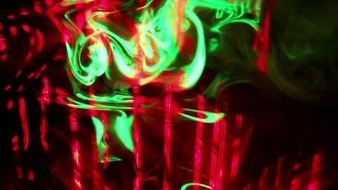 Laser rays lighting through the clouds of smoke. Smoke and laser rays. Stock Footage 69770238