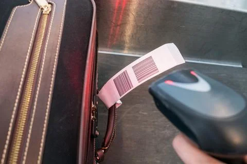 Laser scanner barcode reader scanning for loading luggage bag Stock Photos