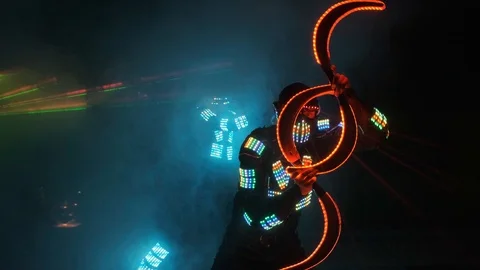 Laser show performance, dancers in suits with LED lamp, very beautiful night par Video stock 110757299