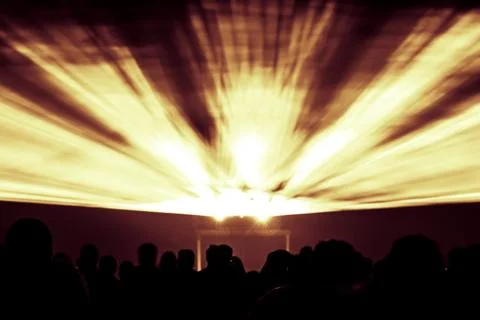 Laser show rays in fire red yellow and orange party colors Stock Photos