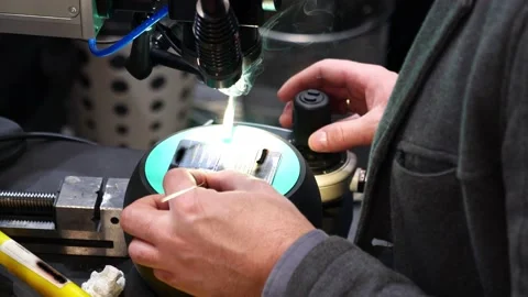 Laser soldering metal under a microscope Stock Footage 197936927