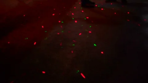 Laser spots light movement on floor at night club floor Stock Footage 93221459