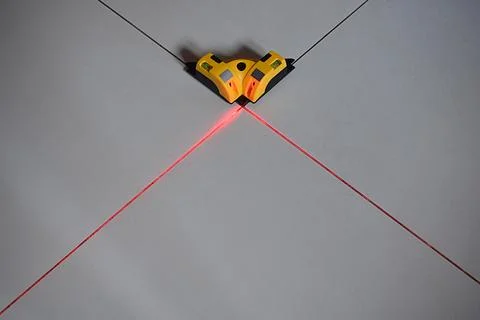 Laser square-level for construction work. Stock Photos