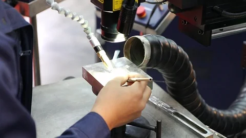 Laser welding process Stock Footage 97390369