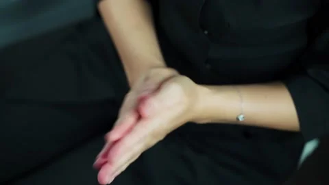 Lash Maker disinfects its hands before starting the procedure Stock Footage 140711211