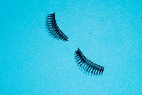 Lashes on blue paper Stock Photos