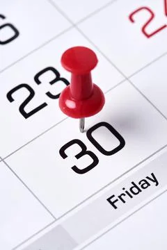 Last chance concept with colored push pins on monthly calendar Stock Photos