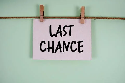 Last Chance paper notes hanging on the rope with clothespins Stock Photos