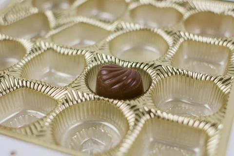 The last chocolates in the candy box Stock Photos
