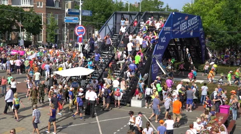 Last day of the 100th Four Days Marches busy crossing walkers and public Stock Footage 66410948