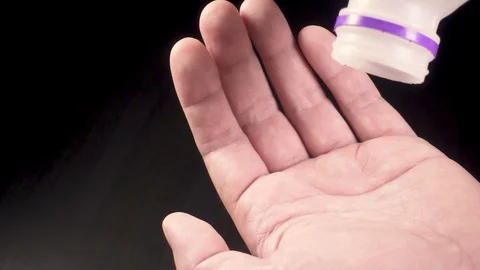 Last drops of water fall into the man's palm Stock-Footage 87405392