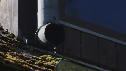 Last Drops of Water Falling Down the Drainage After Heavy Summer Rain. Stock Footage 167045440