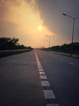 Last light on the road. Stock Photos