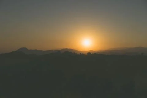 Last light of the sun is falling on the mountain in the evening. Stock Photos