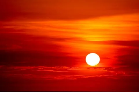 Last light of sunset on  sky cloud ray around sun Stock Photos