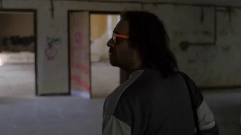 The last man on earth entering an empty place Stock Footage 73337284