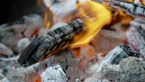 Last pieces of wood burning in a fire in the grill. Close up, macro Stock Footage 192540685
