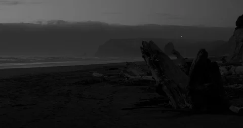 Last rays of sunlight adorn the Oregon Coast below the lighthouse at Cape Blanco Stock Footage 127563509