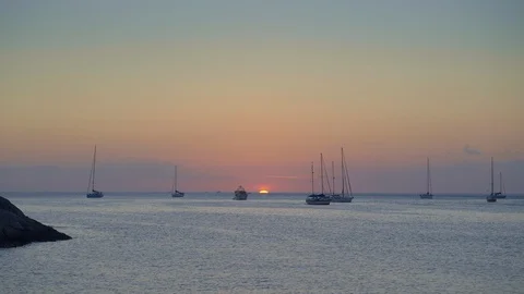 Last seconds of sunset in calm ocean bay with yachts and boats Stock Footage 114827285