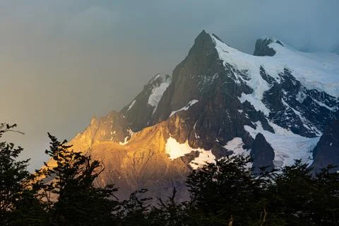 Last sun rays fall on the mountains, Torres del Paine National Park, Chile Stock Photos