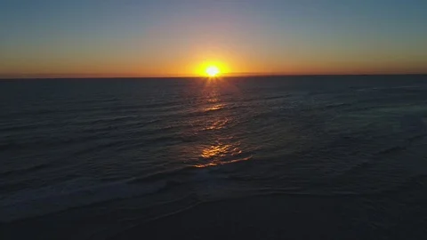 The last Sunset before dark flying out to sea drone 4k Stock Footage 71697555