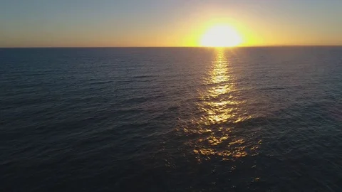 The last Sunset before dark flying out to sea drone 4k Video stock 71697599