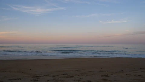 Last of sunset over beach at dusk blue red pink shy Stock Footage 118059762