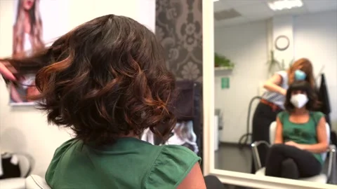 Last touch-up on the client's change of look. Face mask Stock Footage 135595195