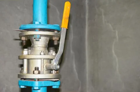 Latch for a cold water pipe. Stock Photos