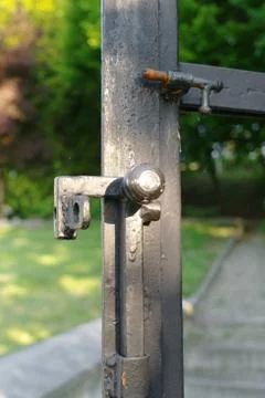 Latch in a iron gate Stock Photos