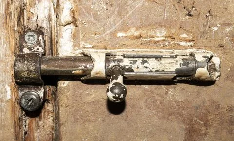 The latch is an old Soviet one.The door latch.The latch for the door. Stock Photos