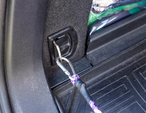 Latch in the trunk of the car for securing goods and objects, close-up Foto stock