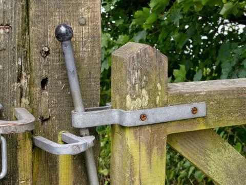 A latching gate as you would find across public park areas in England, UK Stock Photos