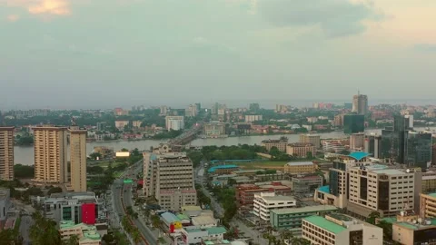 Late afternoon Aerial (Drone) sliding/orbiting shot with parallax of Stock Footage 131218853