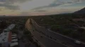 late afternoon aerial over multi lane main street wide shot HD Footage