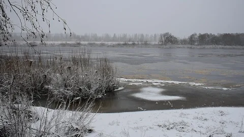 Late autumn river in a blizzard Stock Footage 120601962