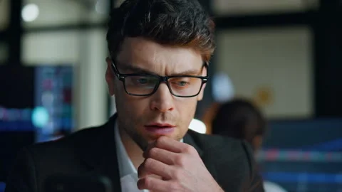 Late businessman thinking problem solution closeup. Serious man trader checking Stock Footage 242714606